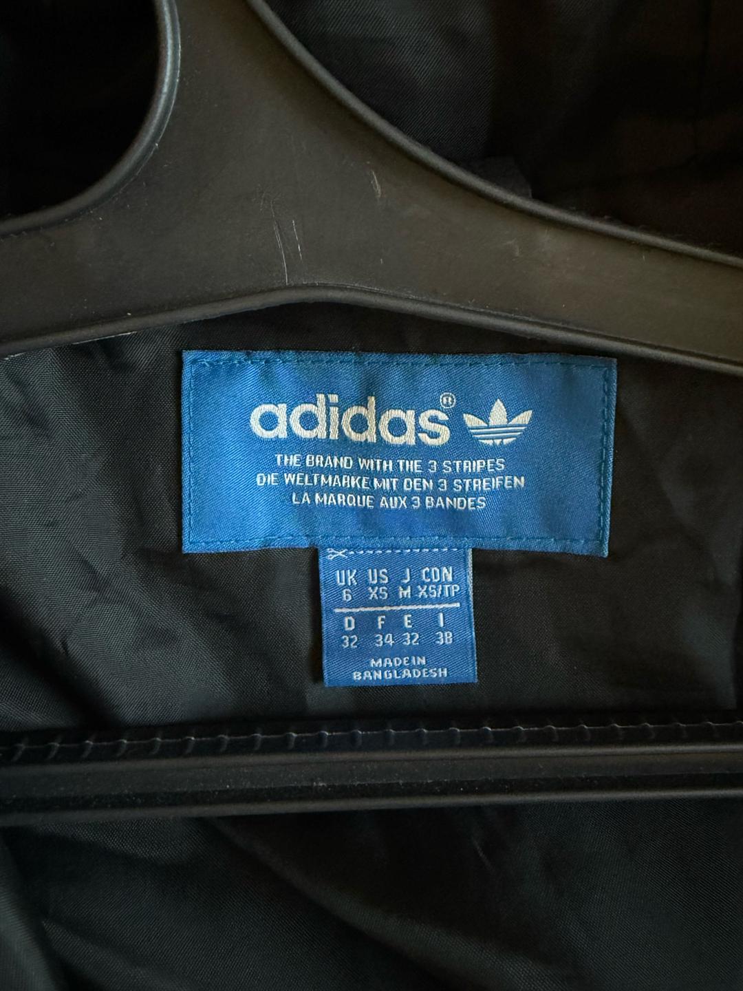 Adidas Женская куртка Adidas — фото 2