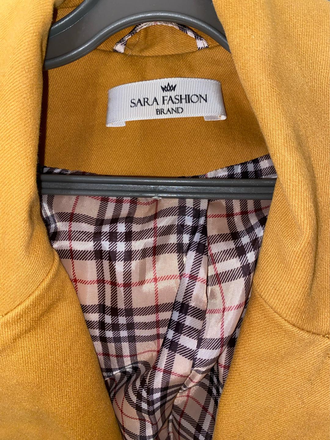 Sara Fashion Тренч горчичного цвета казахстанского бренда Sara Fashion стоил 110000 тыс тенге — фото 2