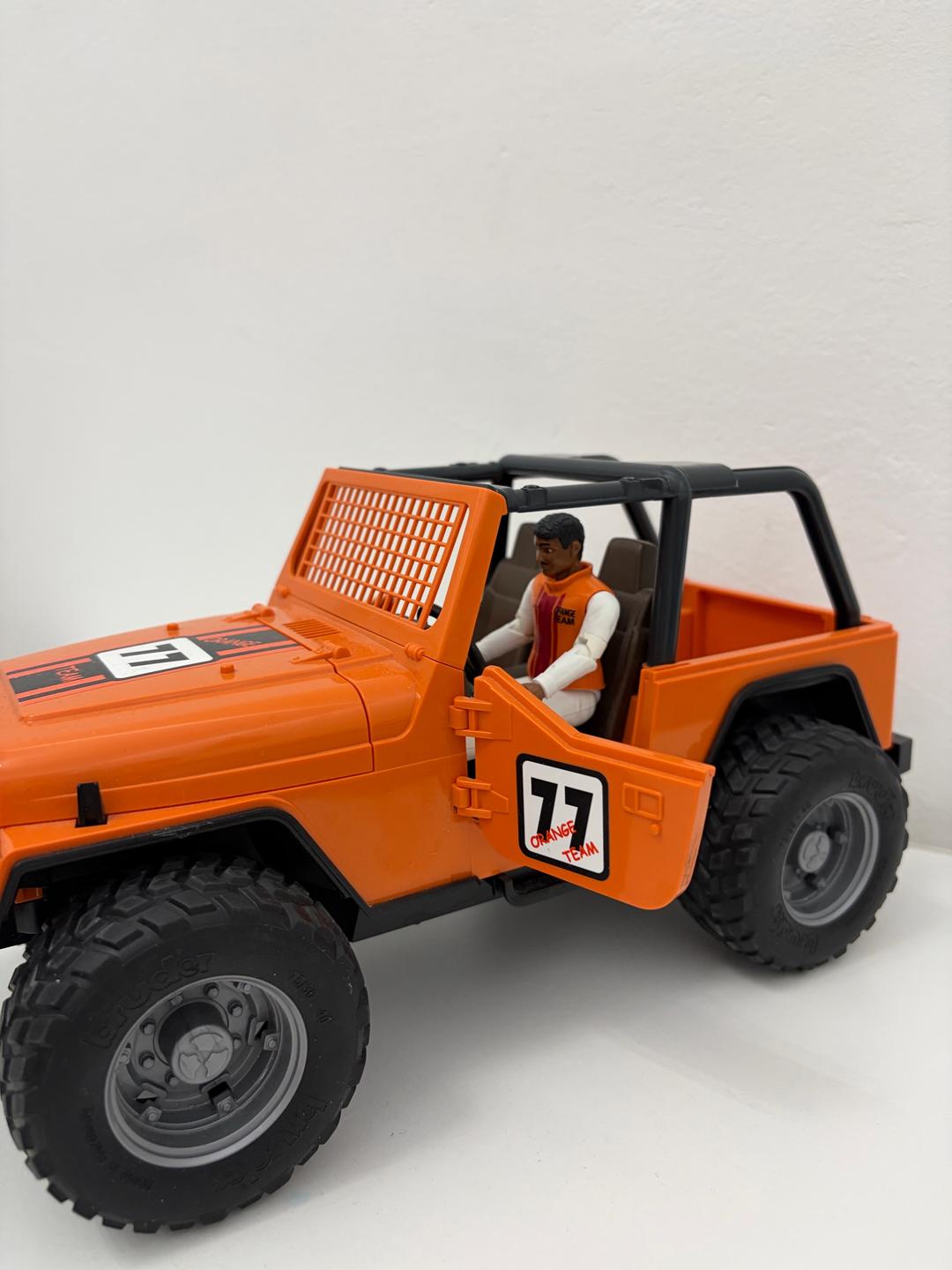 Bruder Оранжевый внедорож Bruder JEEP Cross Country, с гонщиком — фото 2