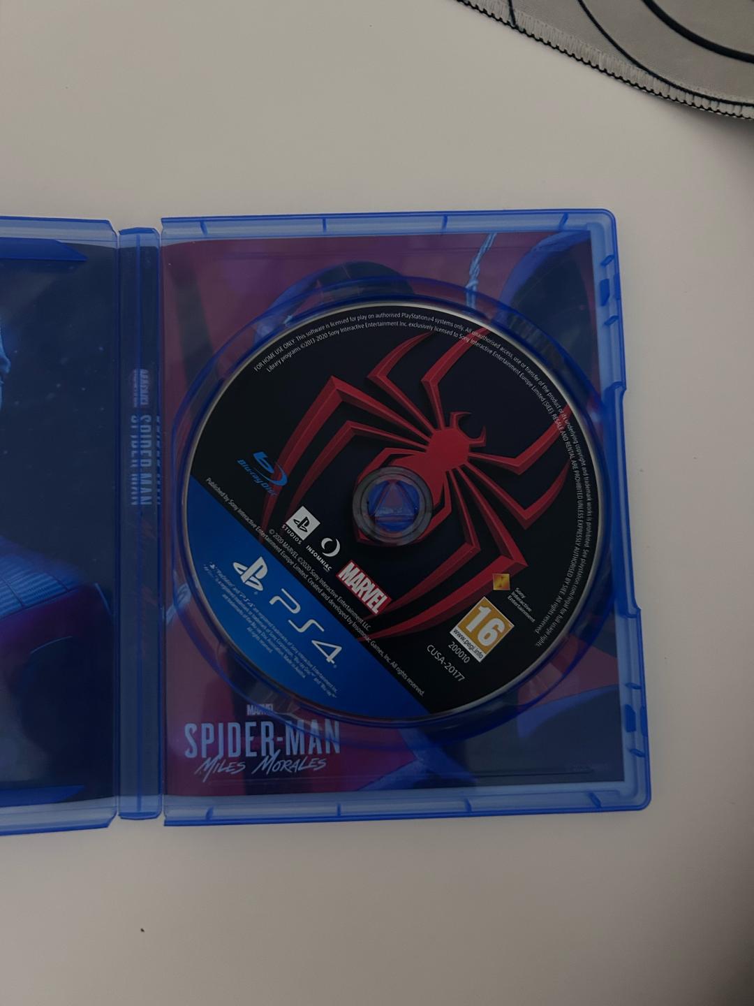 Игра диск spider-man Miles Morales PS4 — фото 2