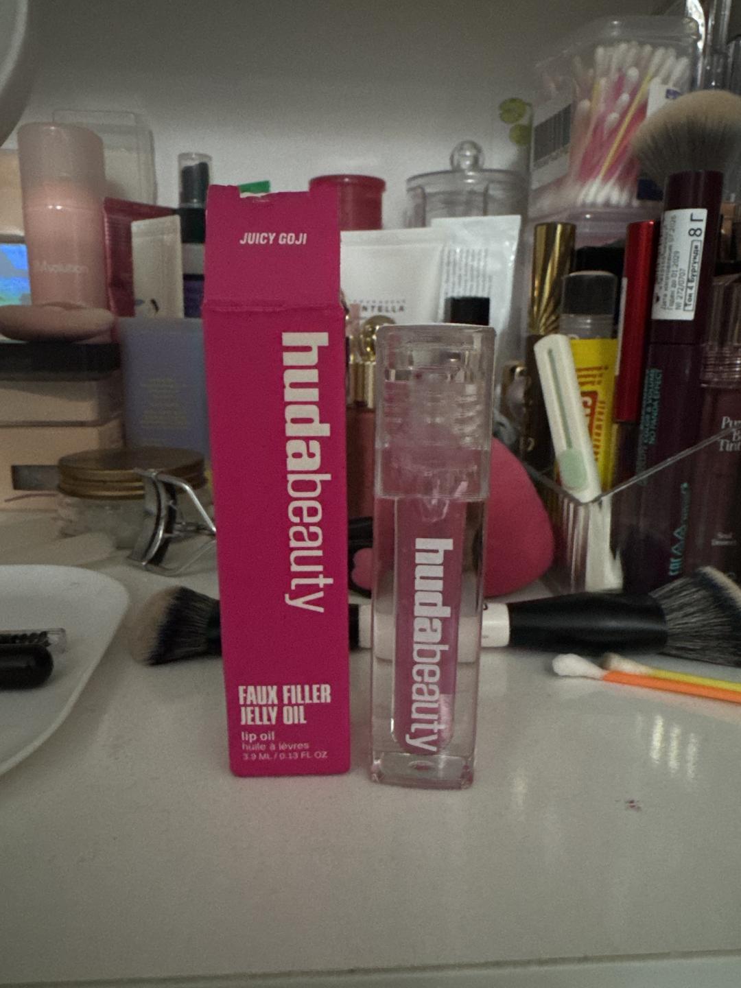 Huda Beauty Масло для губ Huda Beauty Faux Filler Jelly Oil — фото 2
