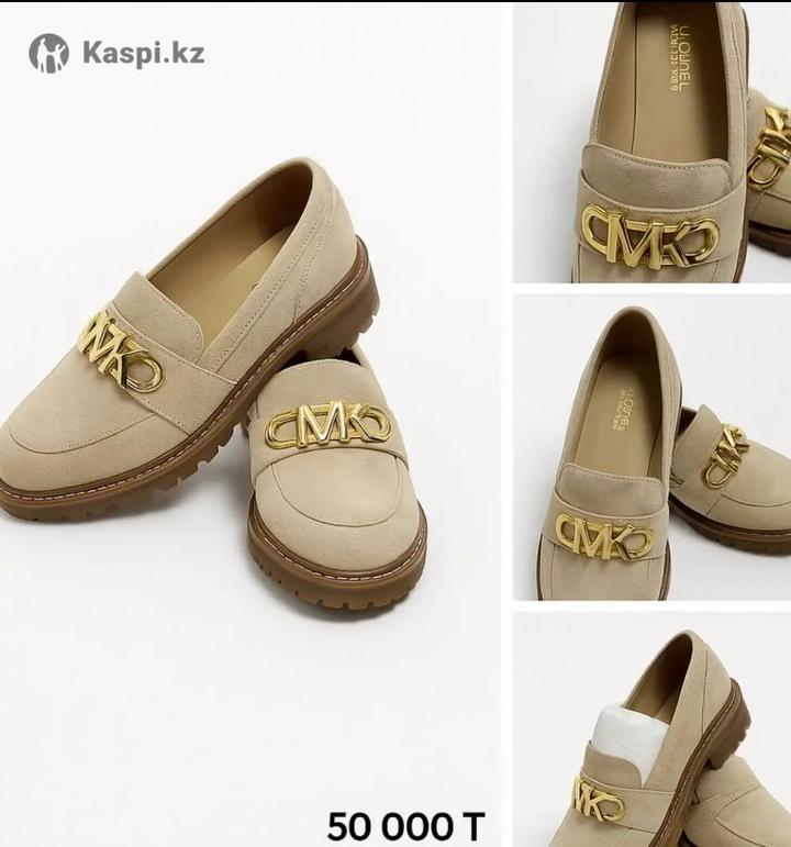 Майкл Корс