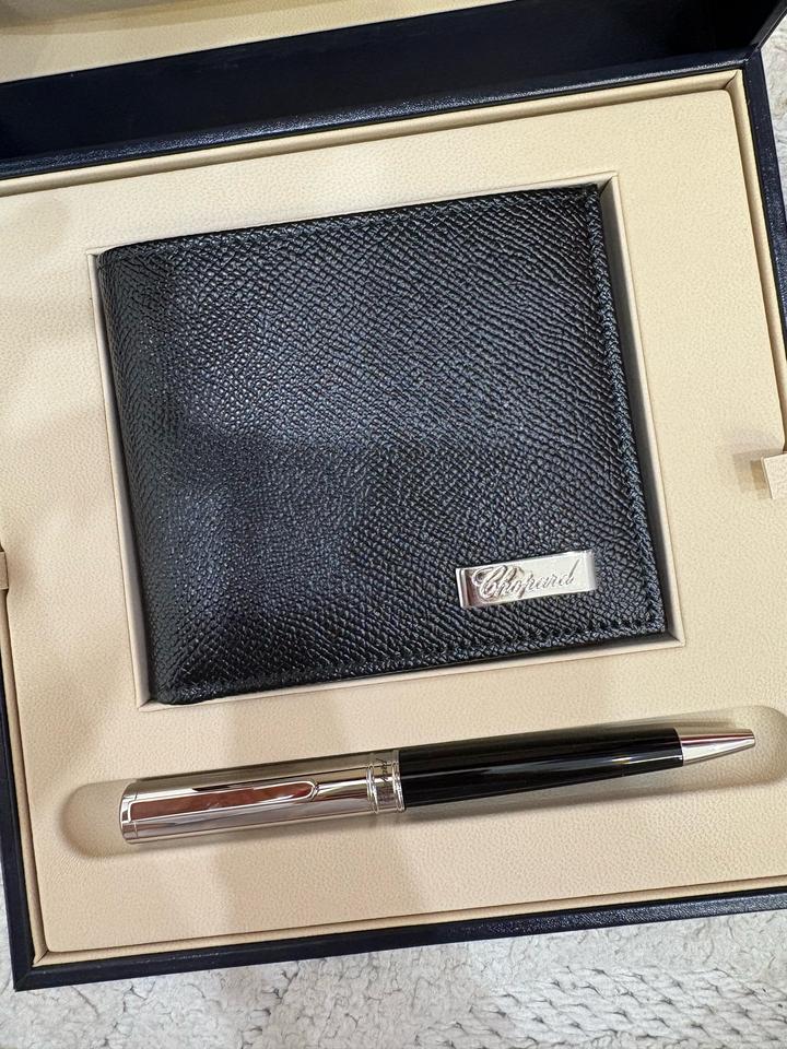 Кошелек и ручка от Chopard
