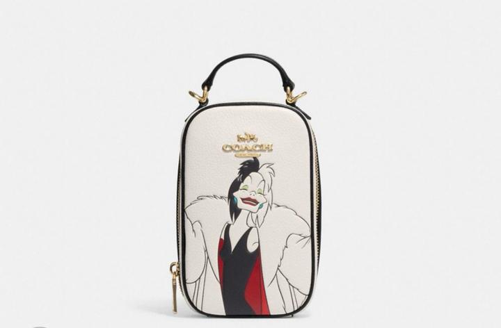 Лимитированная сумочка Disney X Coach Eva Phone Crossbody With Cruella Motif