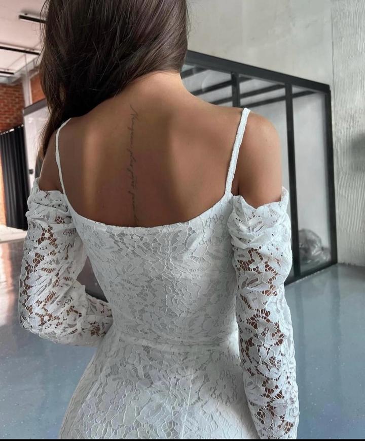 Imaanstudia белое платье из гипюра Alaia с открытыми плечами
