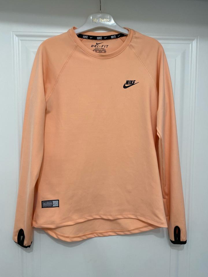 Спортивный лонгслив Nike