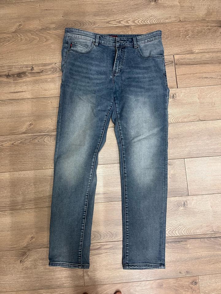 Джинсы Gucci