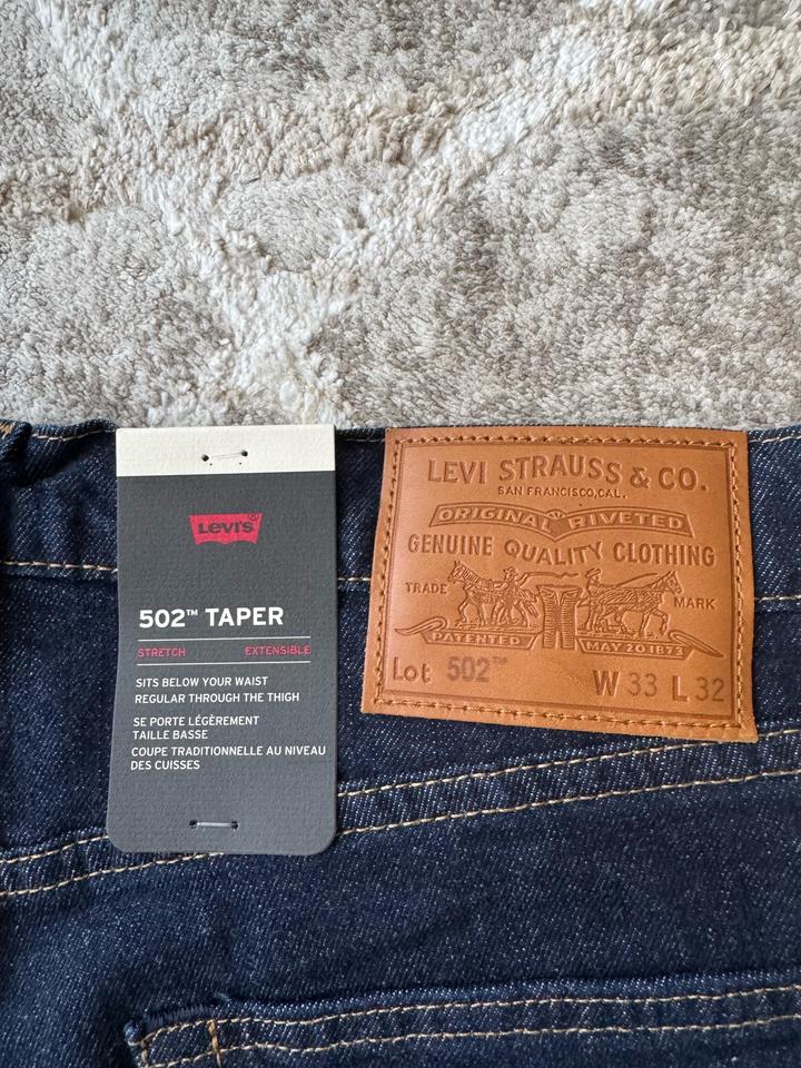 Джинсы Levi's 502 Taper