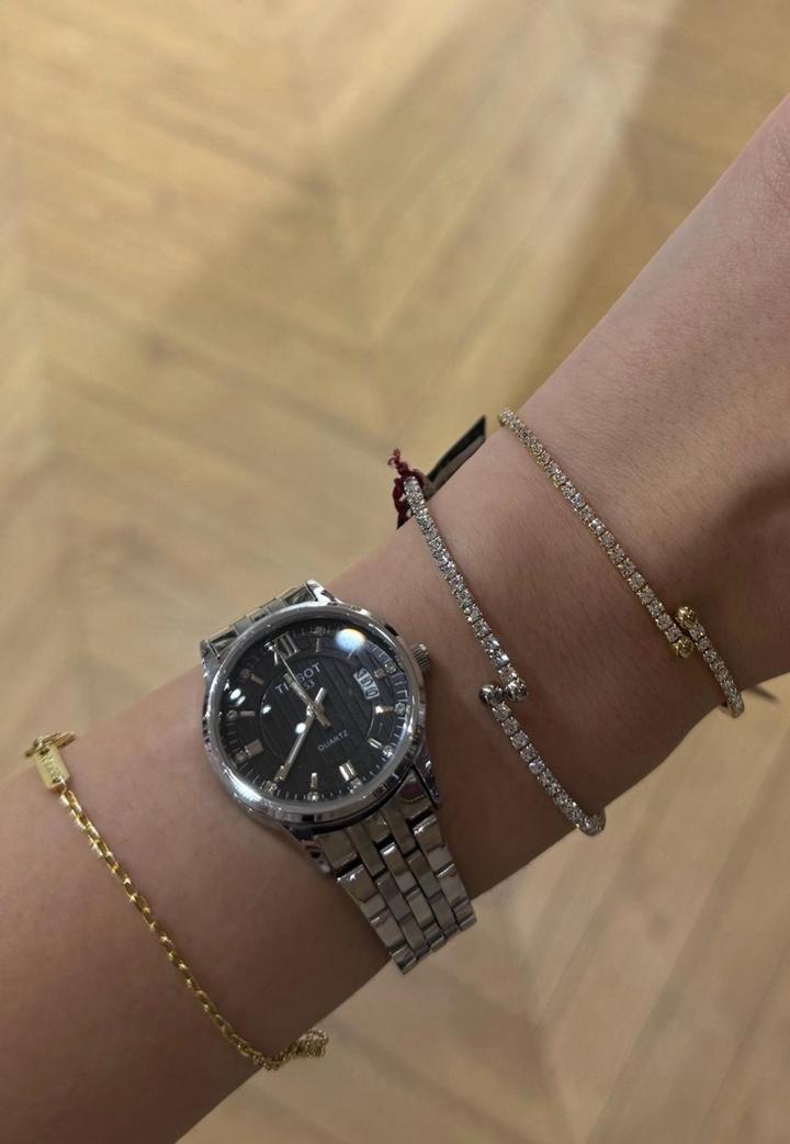 Часы Tissot.