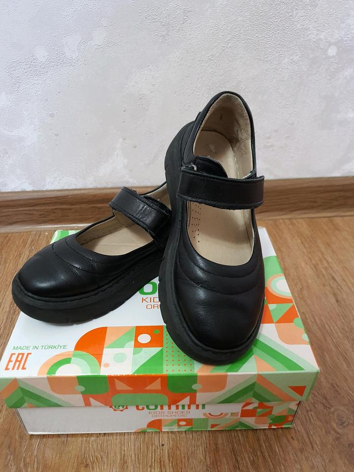 tomini