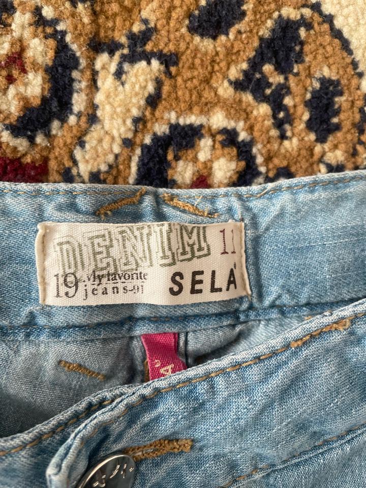 Sela