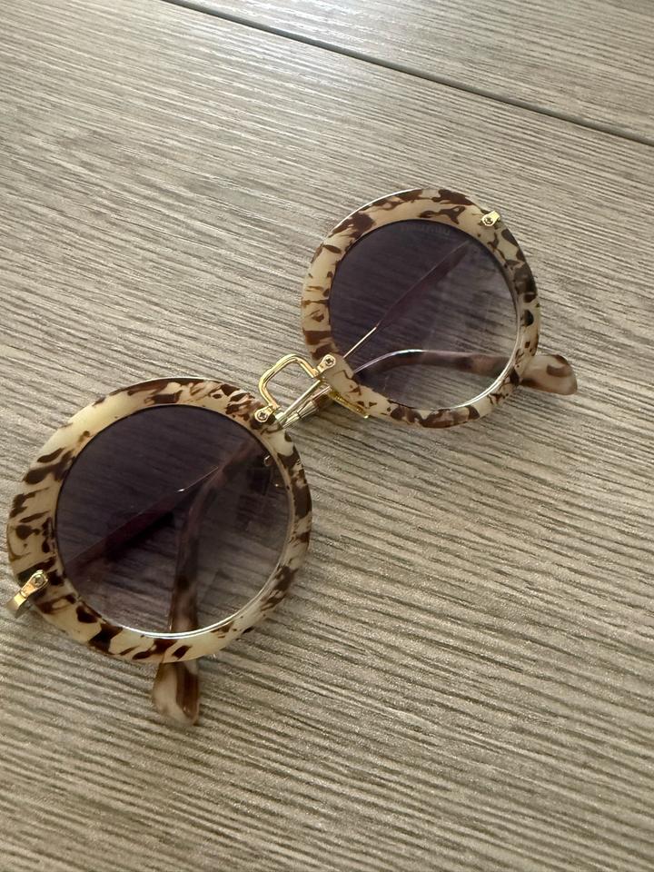 Солнцезащитные очки Miu Miu