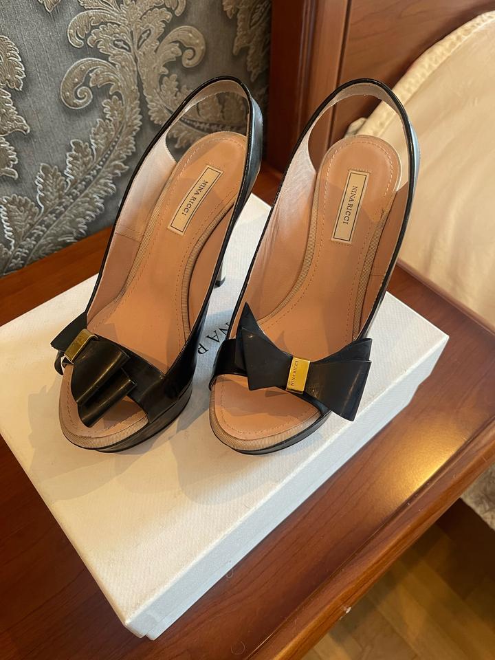 Босоножки Nina Ricci на танкетке