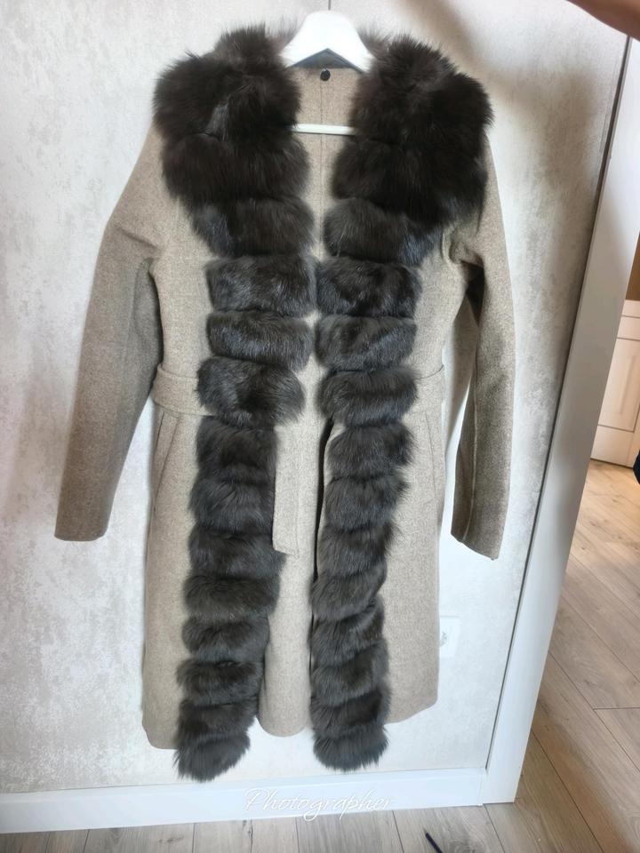 Пальто утепленый