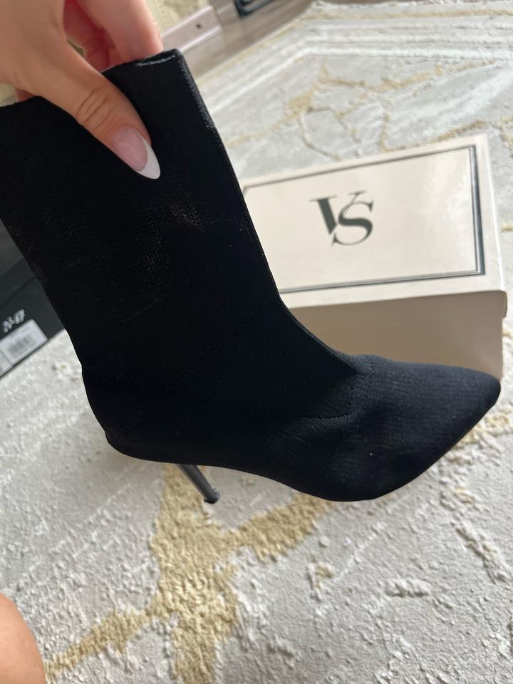 VS