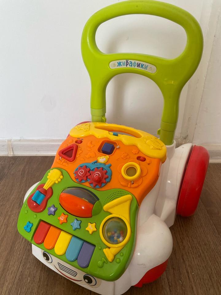 Игрушка каталка