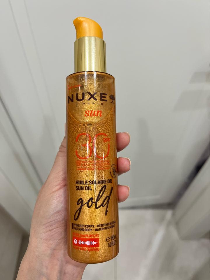 NUXE мерцающее масло для загара SPF 30