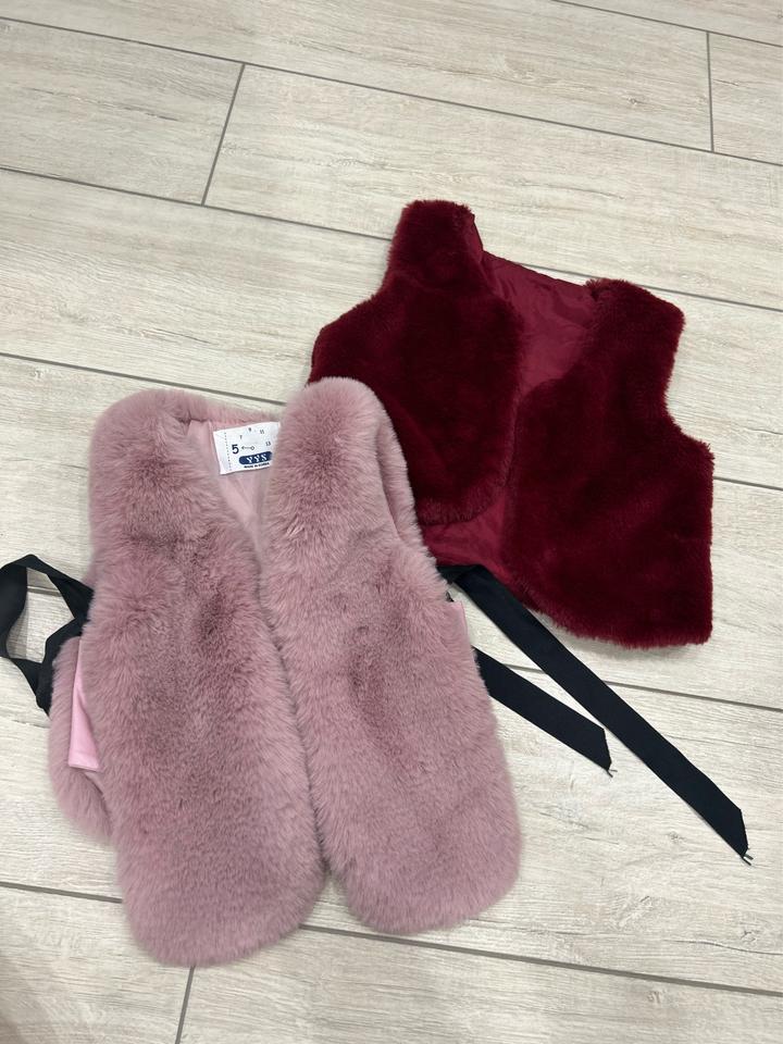 Жилетки меховые