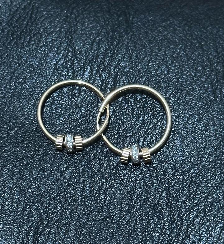Новые золотые серьги кольца 585-й пробы