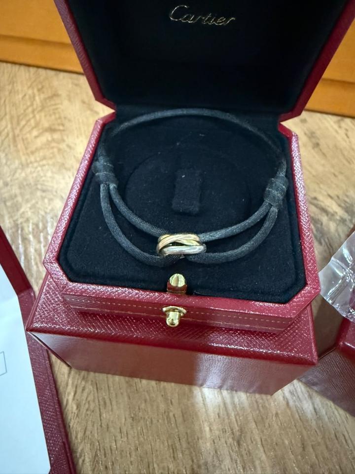 браслет Cartier из золота и шнура