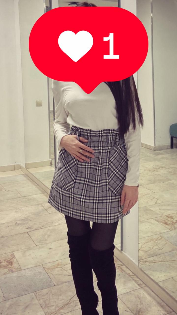 Юбка в клетку с карманами