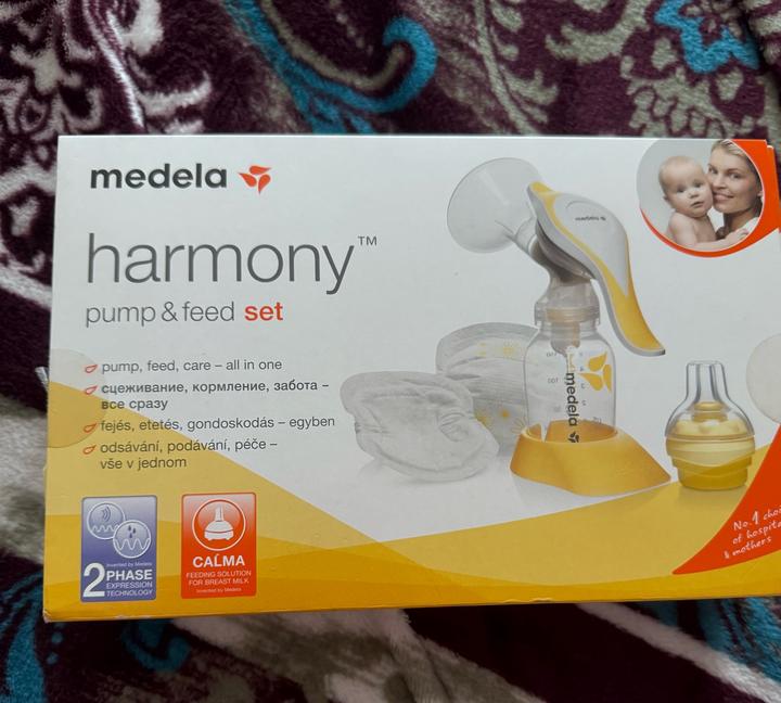 Ручной молокоотсос medela harmony