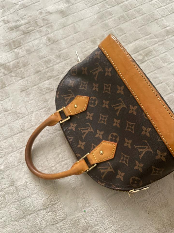 Сумка Louis Vuitton