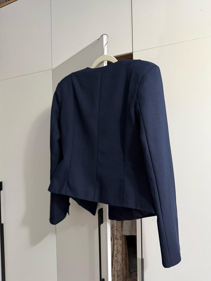 Пиджак новый