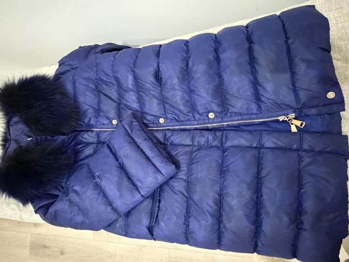 Синий пуховик