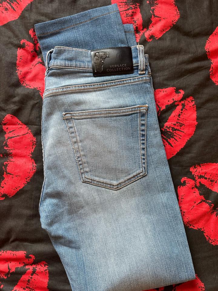 Джинсы Versace