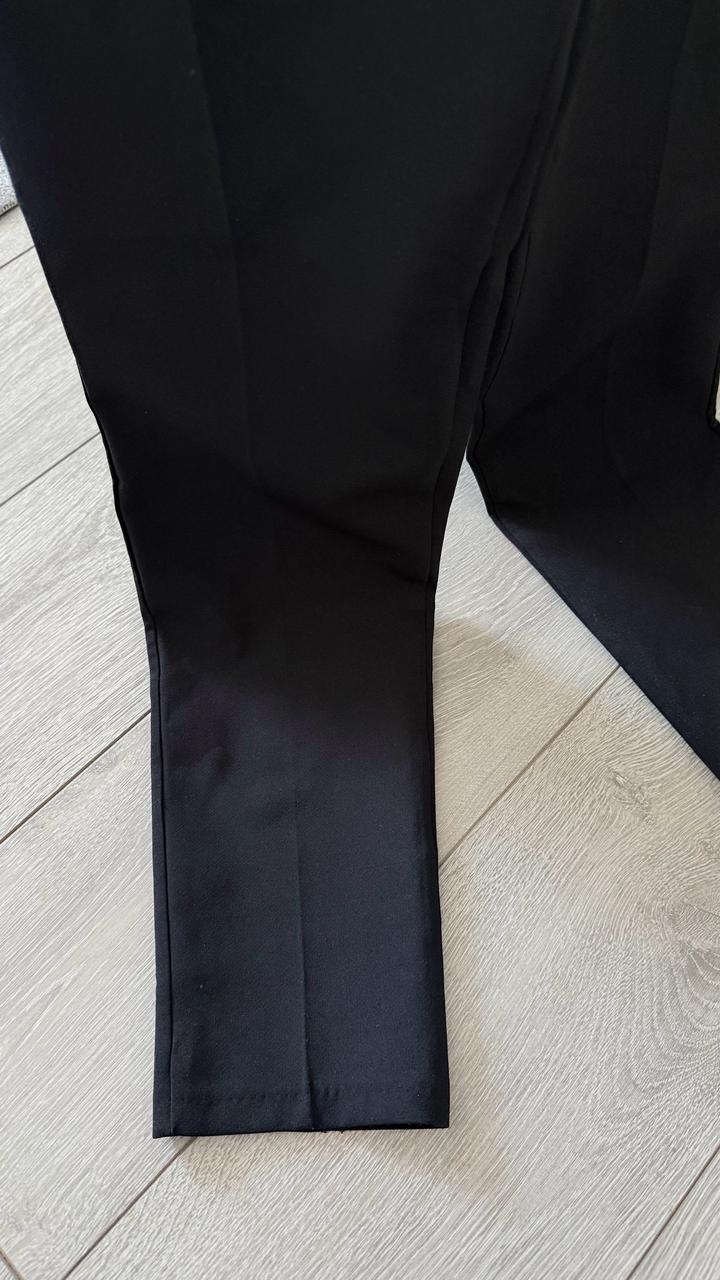 Черный комбинезон женский с перьями