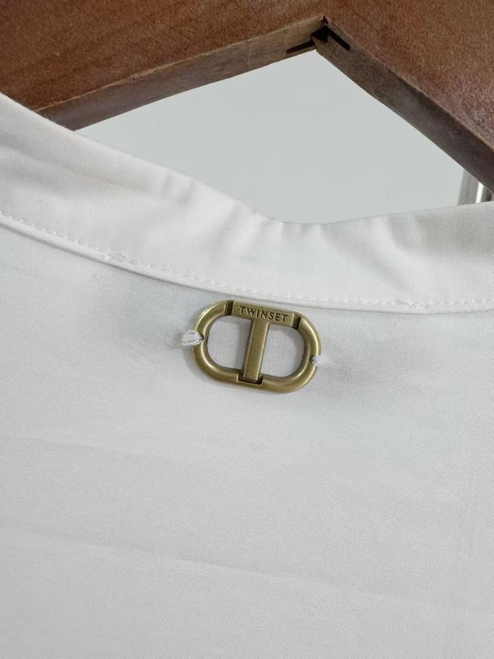 Белая рубашка бренда Twinset