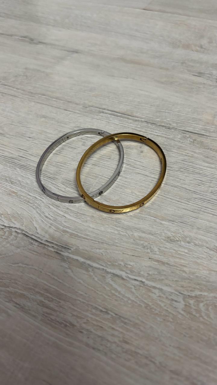 Браслет Cartier из титана золотистый