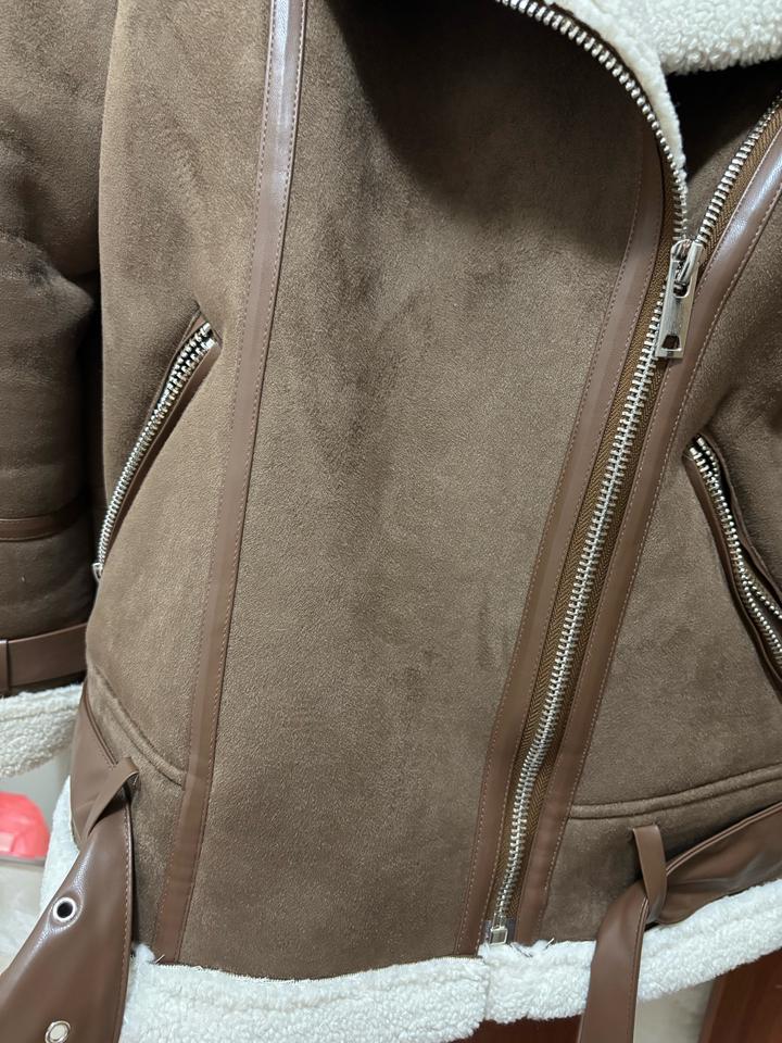 Коричневая дубленка