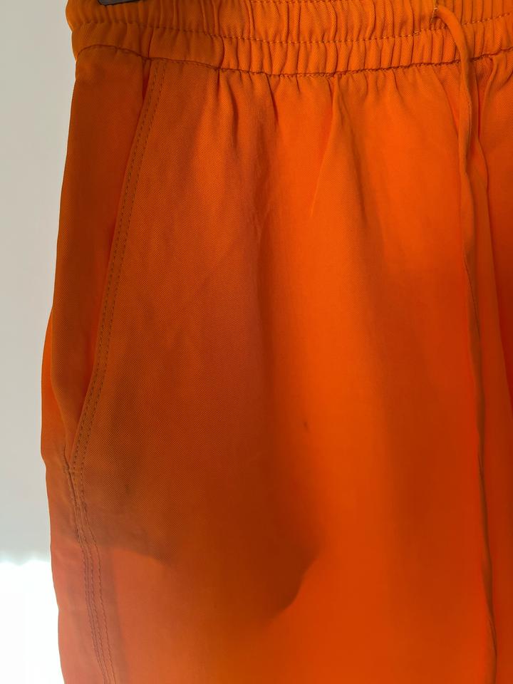 Оранжевые брюки Zara