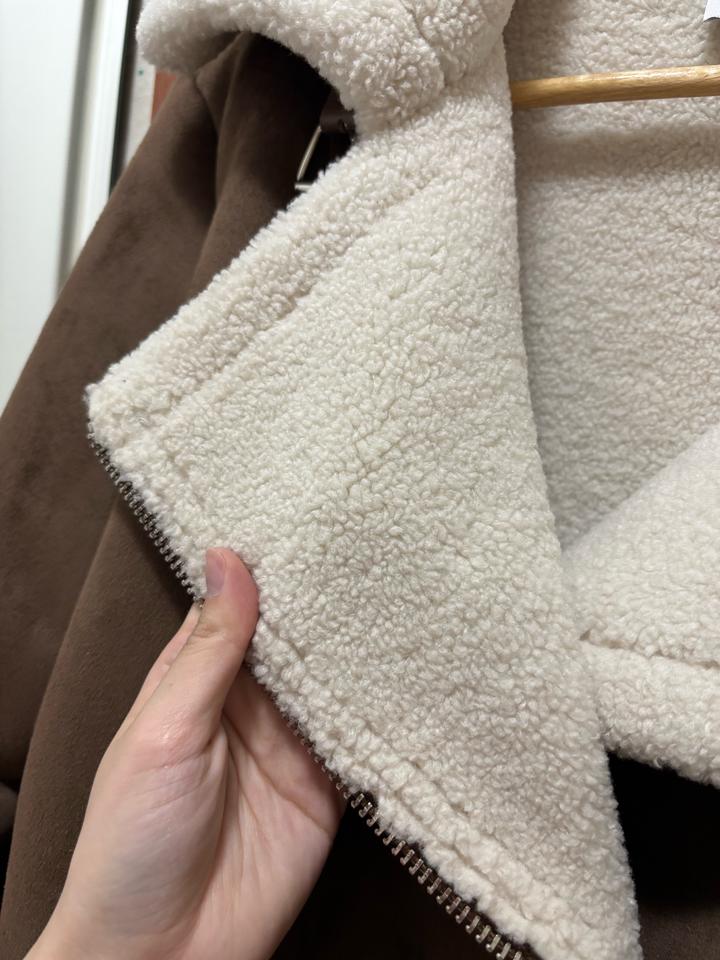 Коричневая дубленка