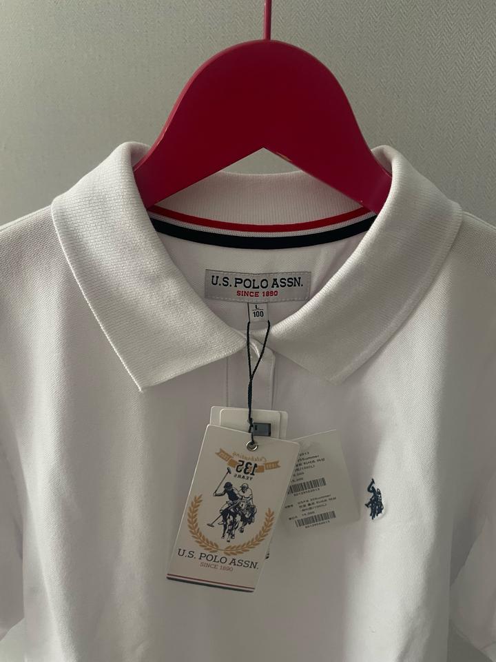 белая футболка-поло от американского бренда U.S. Polo Assn