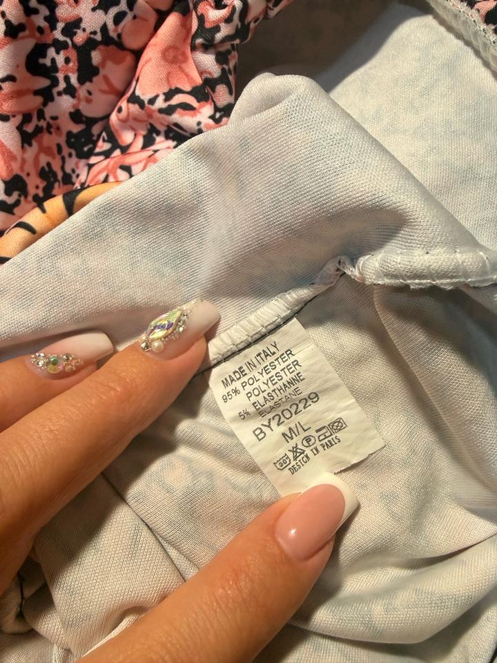 Яркие брюки клёш с цветочным принтом