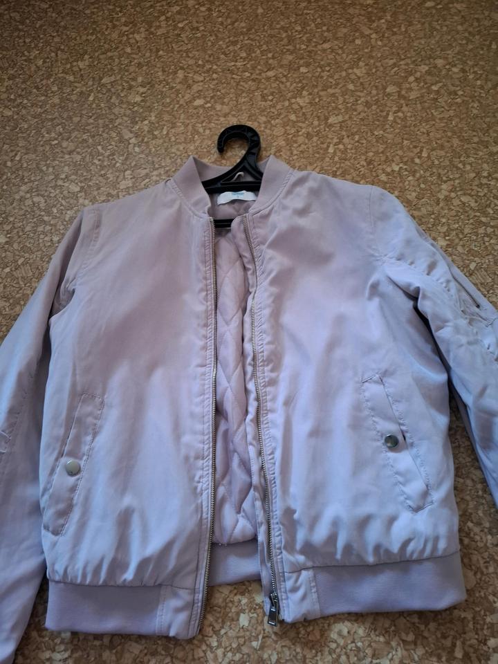 Продам курточку