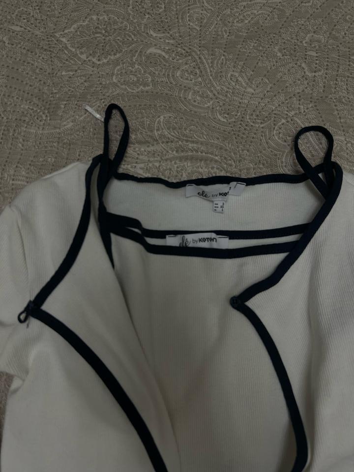 Белая кофточка