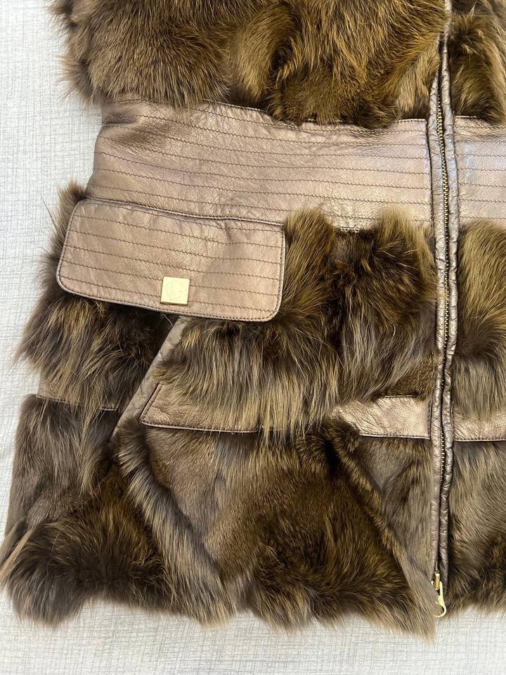 Меховая жилетка