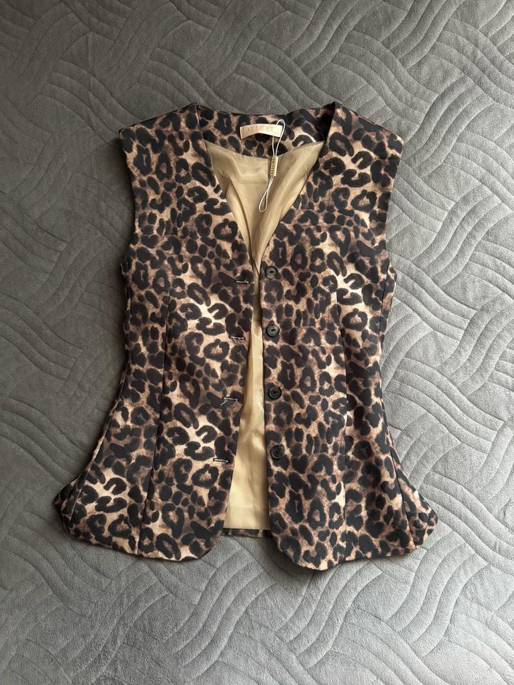 Леопардовый жилет