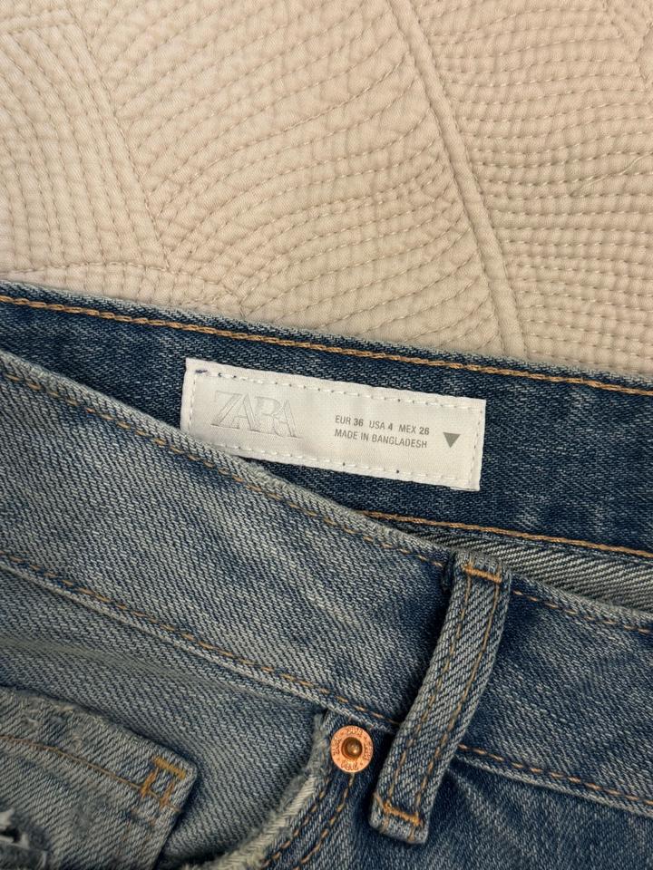 Рваные джинсы Zara