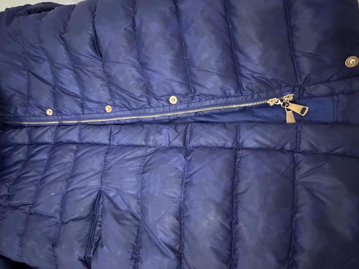 Синий пуховик