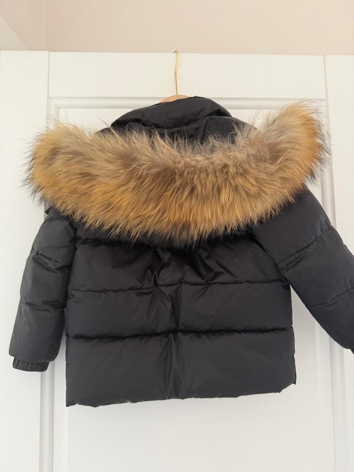 Зимний пуховый комбинезон moncler