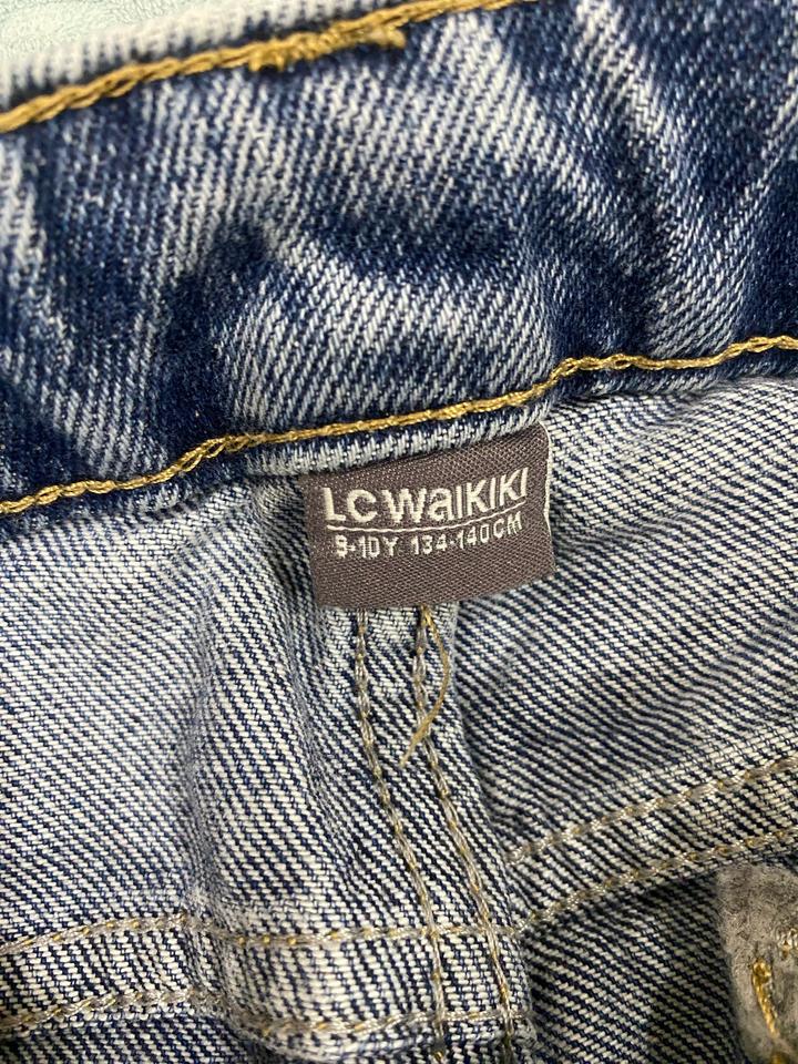 джинсы клеш