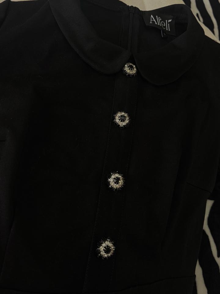 Трикотажное платье от бренда “Alfeli”