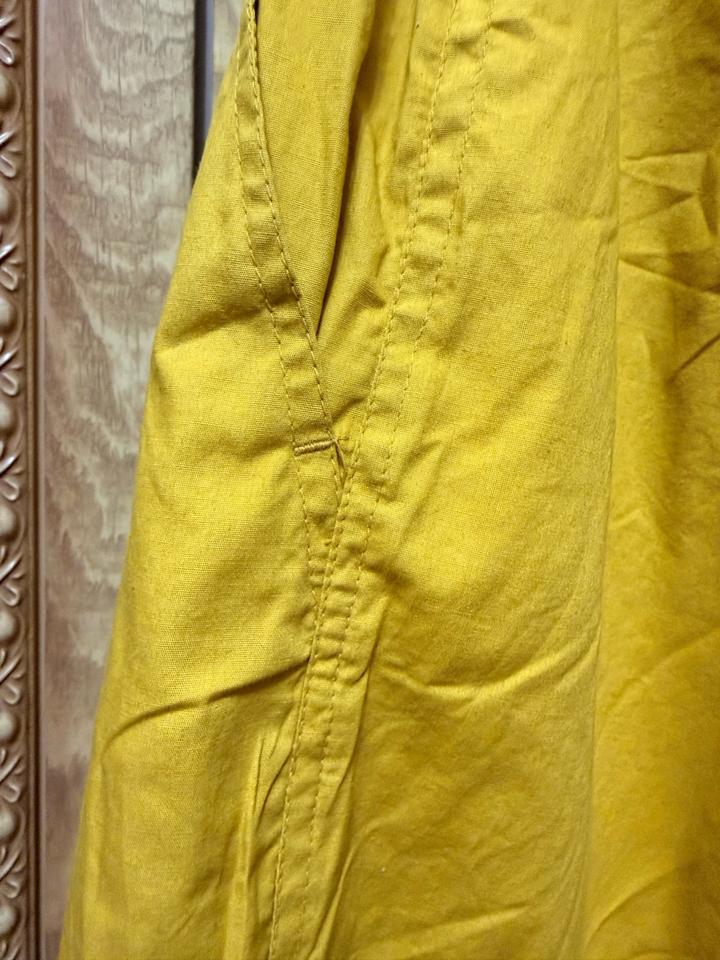 Утеплённые горчичные брюки oversized с необычным кроем S/M