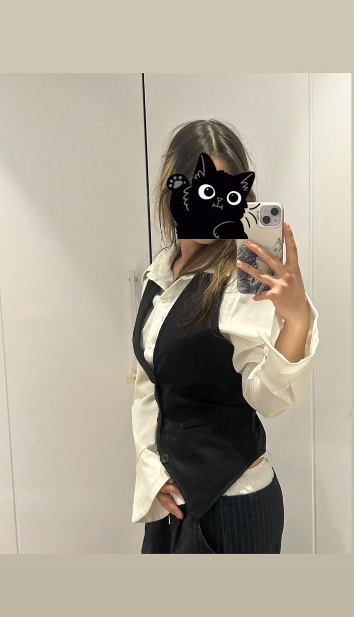 черная жилетка