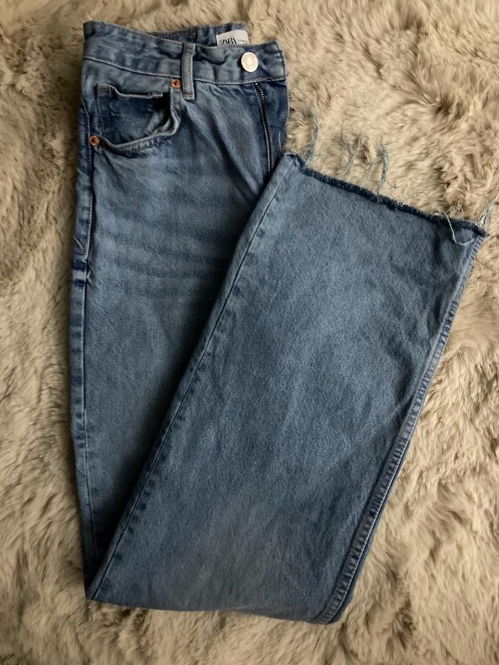 Голубые джинсы 28